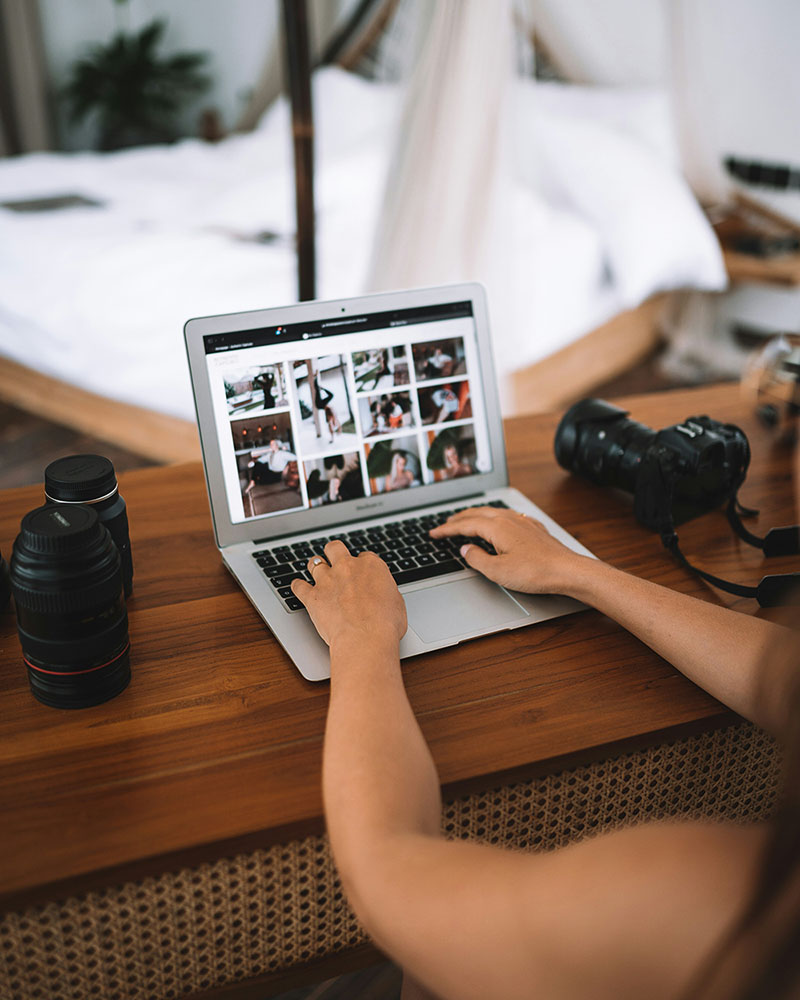 Foreign expat working on a laptop in Bali after securing the right Indonesia visa