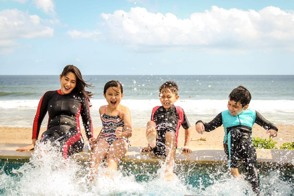 Happy family of tourists in Bali after a smooth Indonesian visa process